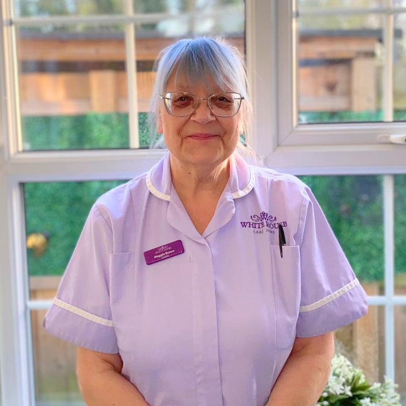 head shot of care assistant