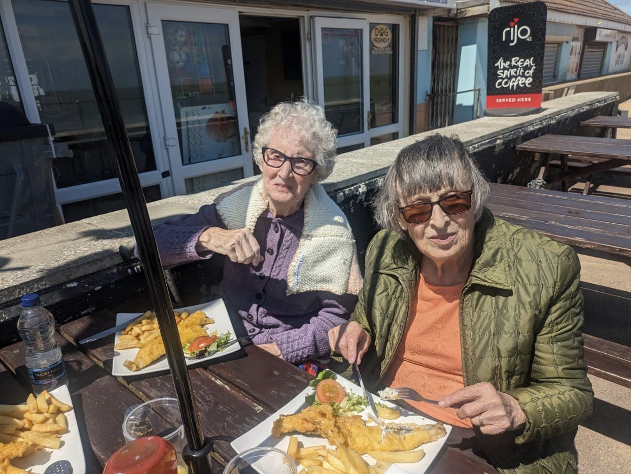 residents eating some fish and chips